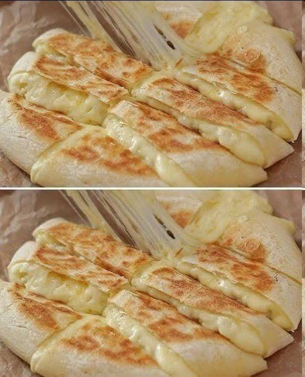 Pane all’aglio con formaggio friabile: una delizia irresistibile da condividere